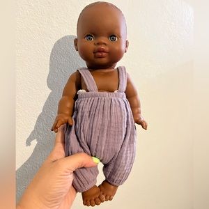 EUC Minikane Remi Black Baby Girl w/ Blue Eyes